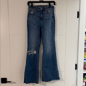 American Eagle Super High Rise Flare Jeans with Ripped Detail